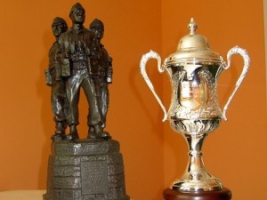 Two trophies from the Alec Lucas memorial tournament