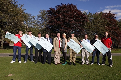 Alec Lucas Memorial Trust presents cheques to local sports club and to the army